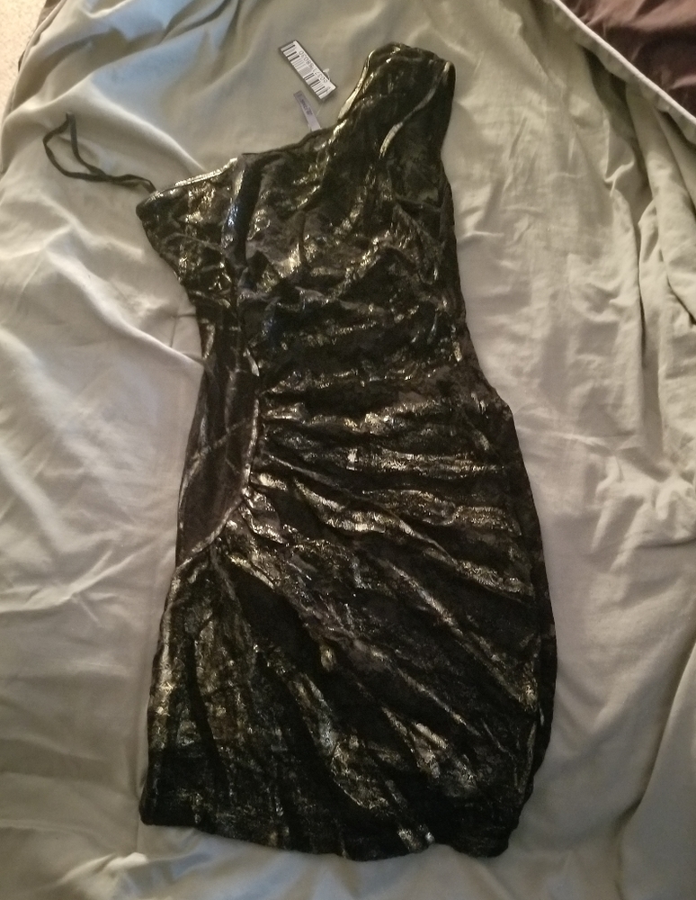 Black lace dress with gold detail